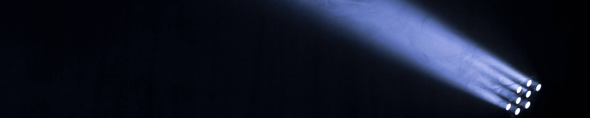 A spotlight against a black background